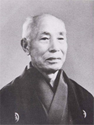 初代副社長兼常務取締役 吉田 眞一